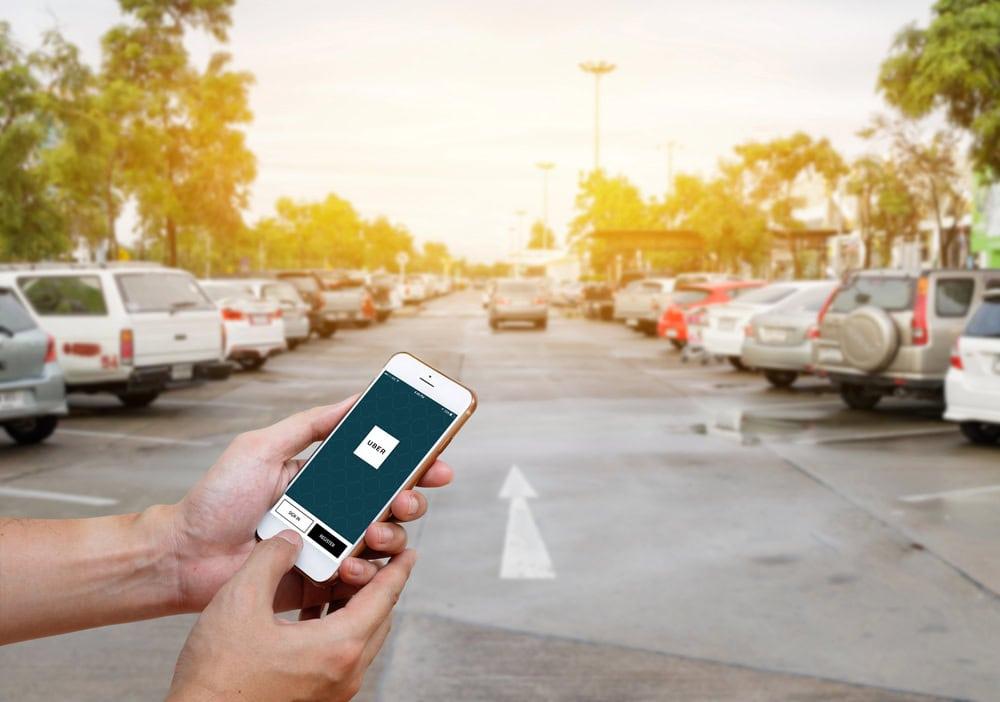 Attorney explaining insurance coverage for accidents involving Uber or Lyft drivers