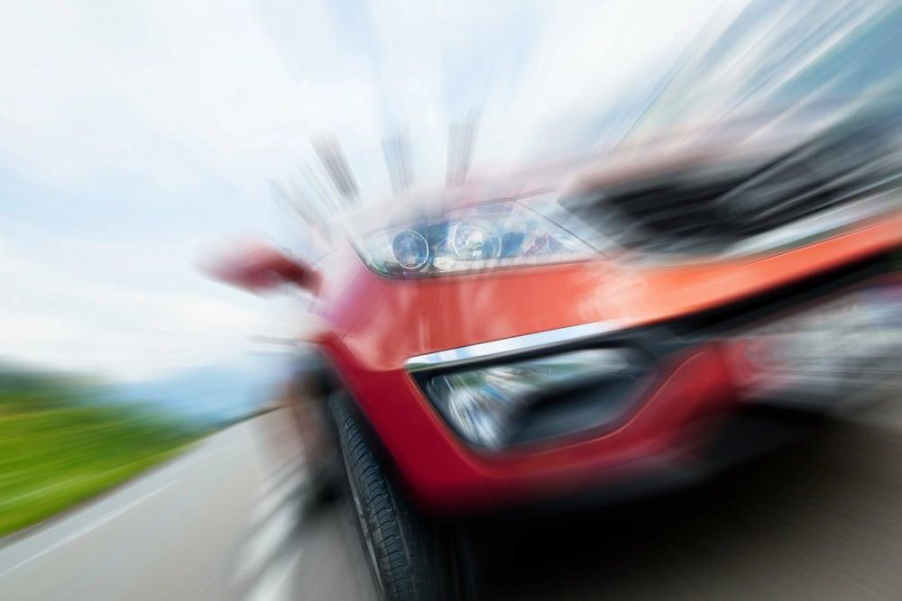 Negligent driving captured in a brake checking incident on a busy road
 