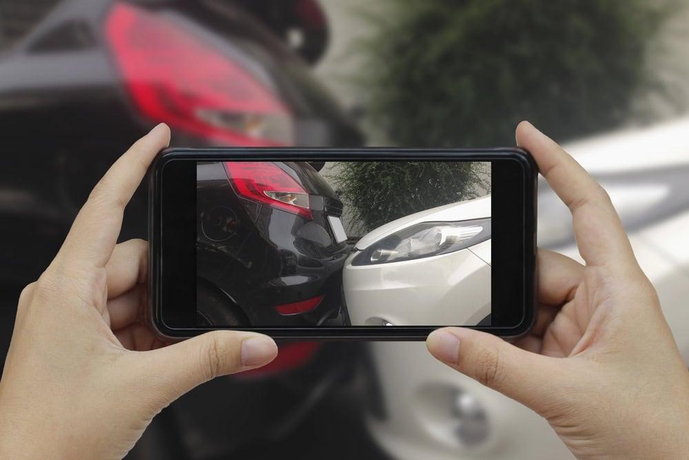 Chicago lawyer reviewing a rear end collision settlement offer with a client