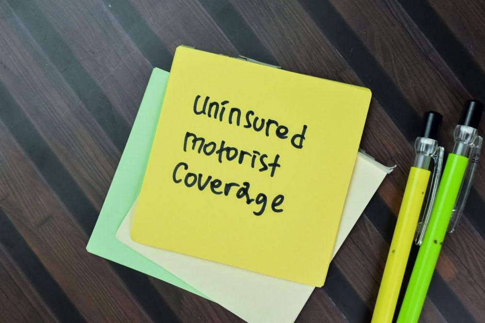 Personal injury lawyer offering legal advice after a car accident without insurance.