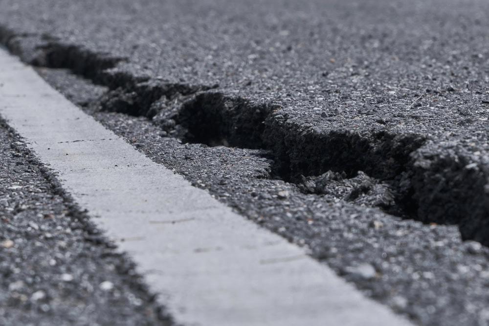 Lawyer assisting victims of car accidents caused by road defects