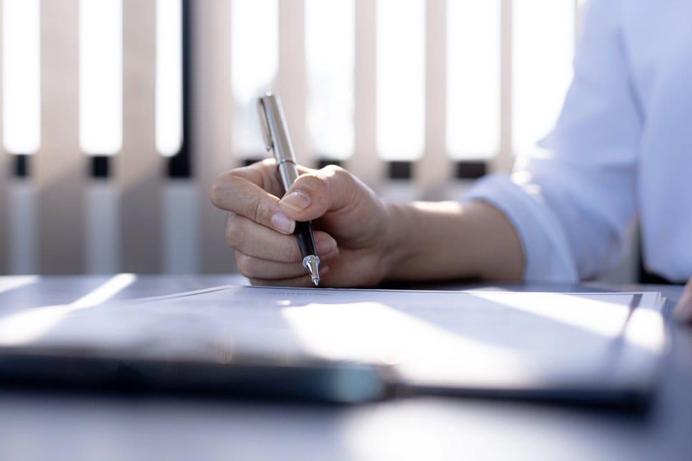 Lawyer helping client recover compensation after a rideshare accident.