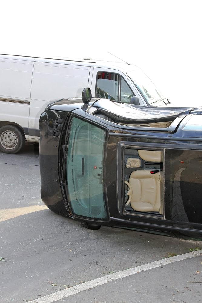 Sideswipe crash involving two cars on a multi-lane road in downtown Chicago
 