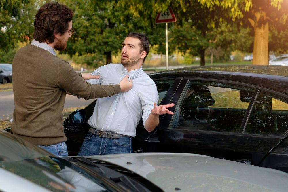 Lawyer helping car accident victims navigate comparative negligence laws.