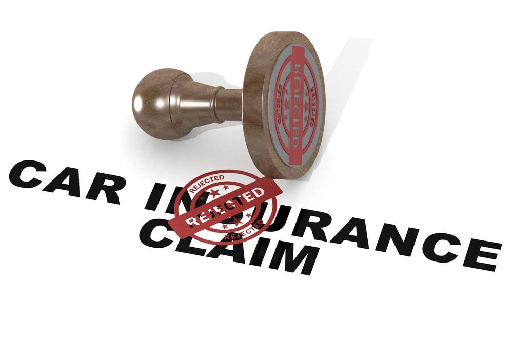 Chicago car accident lawyer reviewing a denied USAA insurance claim.
 