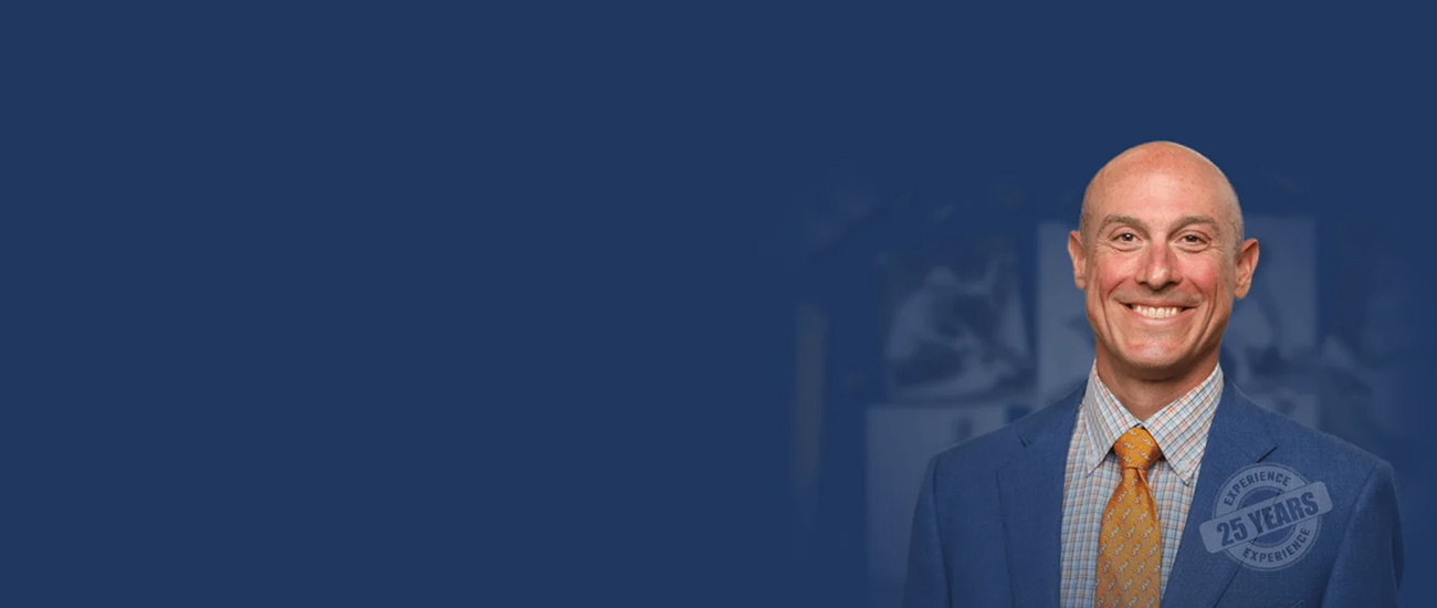 Jonathan Rosenfeld with a blue dark background