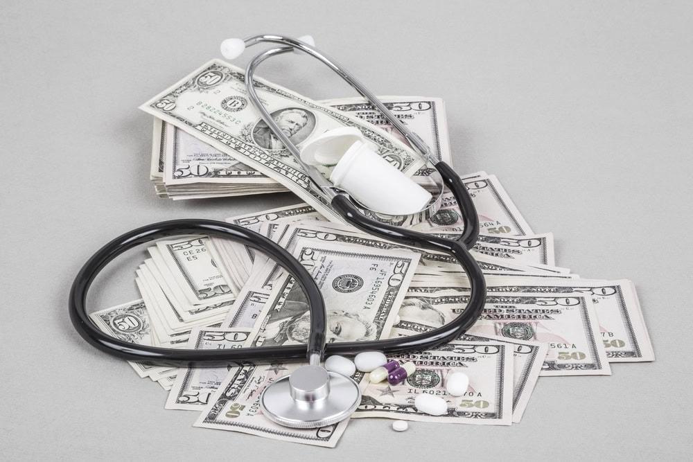 Victim of a car accident facing medical expenses and dealing with insurance