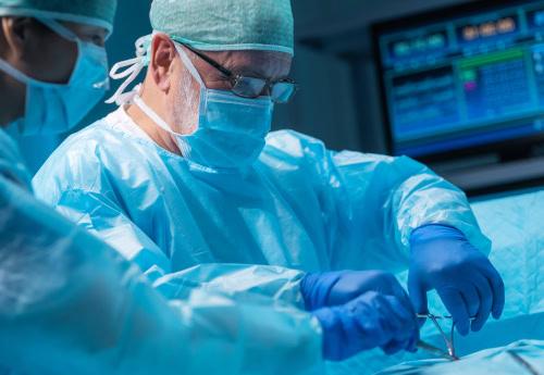 Role of surgery in workers' compensation settlement