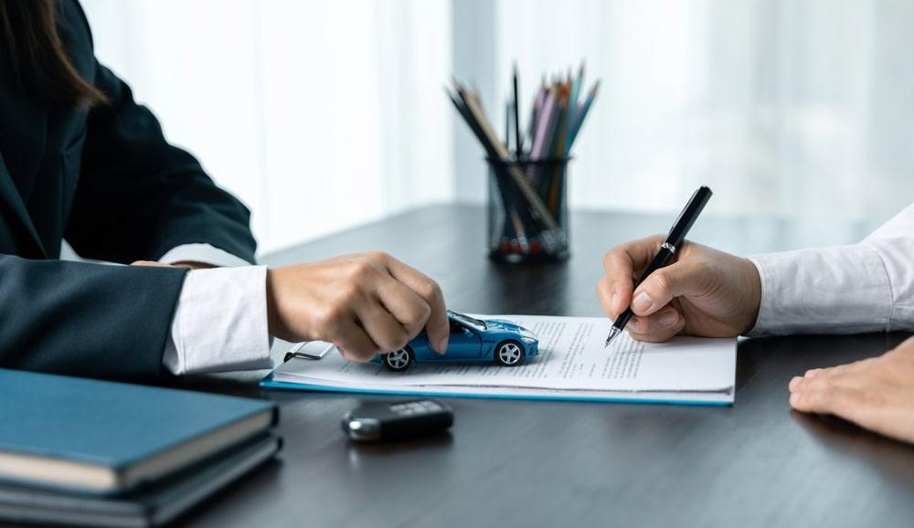 Chicago lawyer helping a client respond to an insurance company stalling a car accident claim.