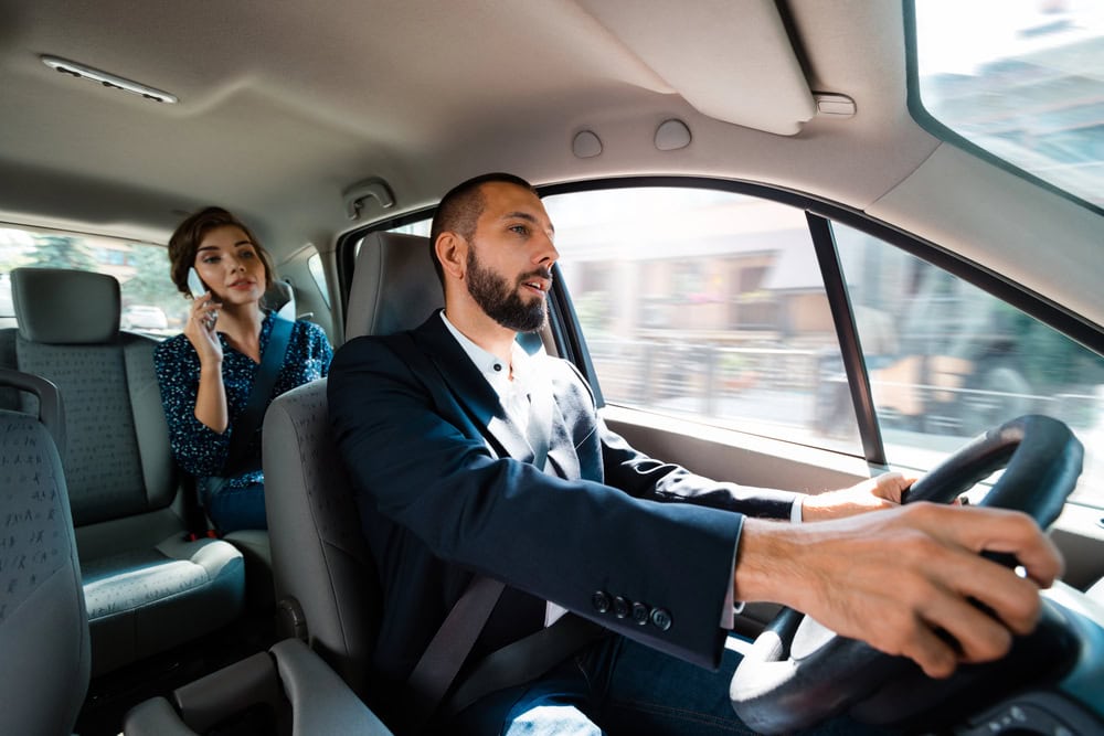 Lawyer preparing a personal injury case for a client injured in an Uber accident.